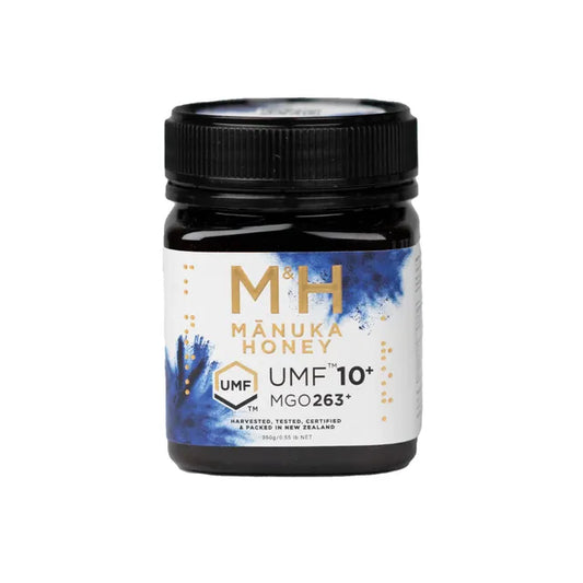 A jar of Manuka Hunters Manuka Honey with a label indicating UMF '10+' and MGO263+.